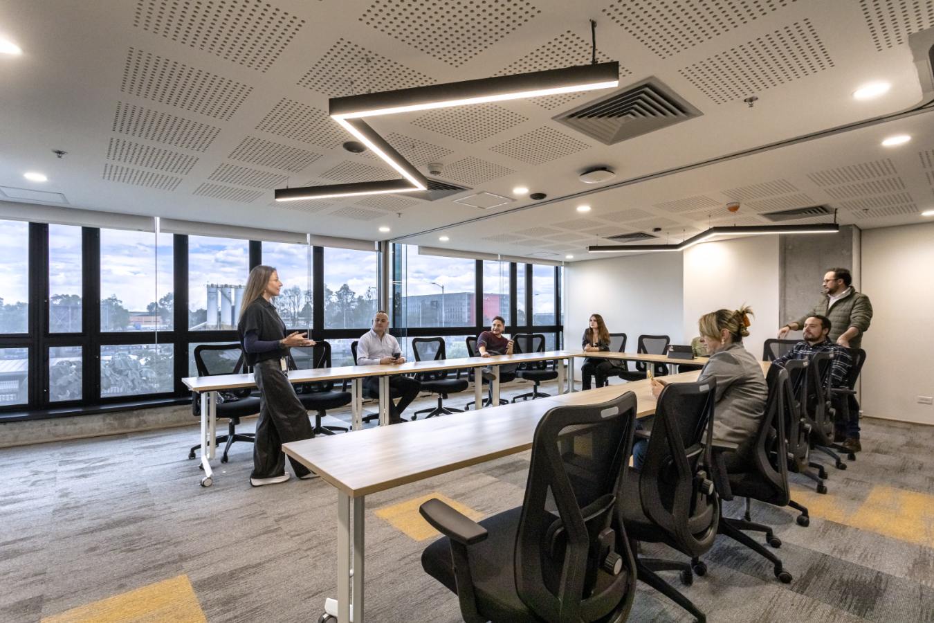 Emapta Offices - Open plan workspace with ergonomic stations and abundant natural light - Contract Workplaces.jpg